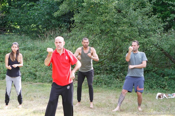 Group Taikiken backfist training on the field